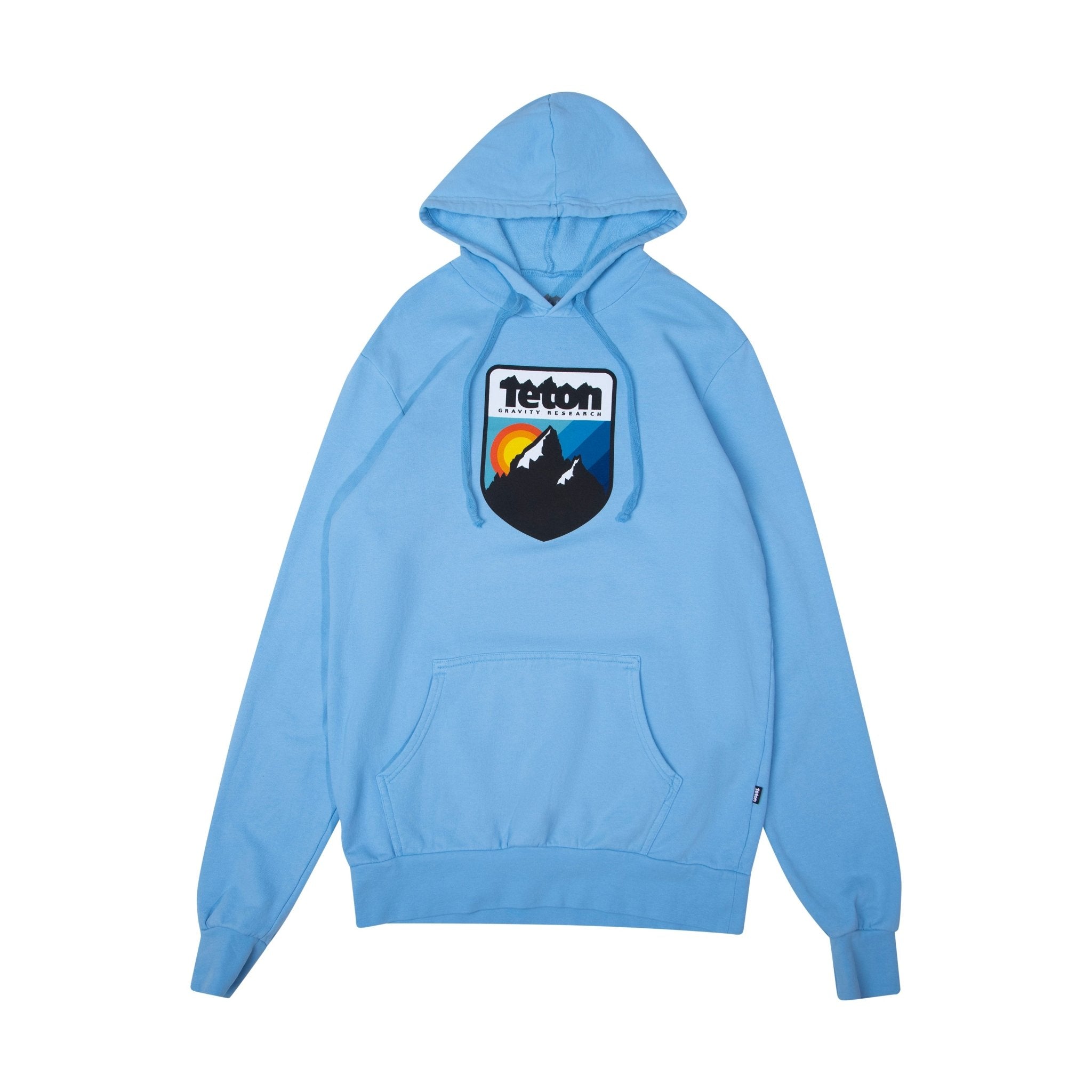 Retro Camp Hoodie 2.0 - Teton Gravity Research. Blue colored sweatshirt with Teton Gravity Research logo with mountains and colorful sunset. #color_baby blue