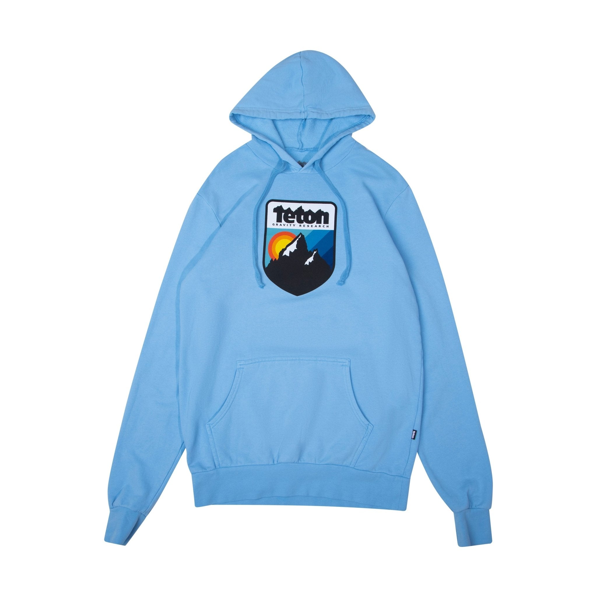 Retro Camp Hoodie 2.0 - Teton Gravity Research. Blue colored sweatshirt with Teton Gravity Research logo with mountains and colorful sunset. #color_baby blue