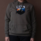 Retro Camp Hoodie 2.0 - Teton Gravity Research. Army green colored sweatshirt with Teton Gravity Research logo with mountains and colorful sunset.